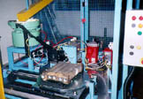 automatic adhesive dispensing system for heat exchangers