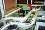 Flexlink conveyor system with pallets for automatic assembly system